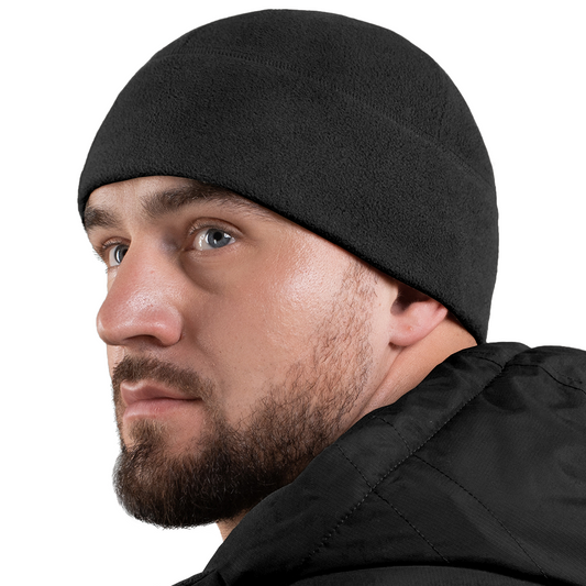 Men's wearing M-Tac Elite Fleece Watch Cap, black, lightweight polyester hat suitable for cool weather.