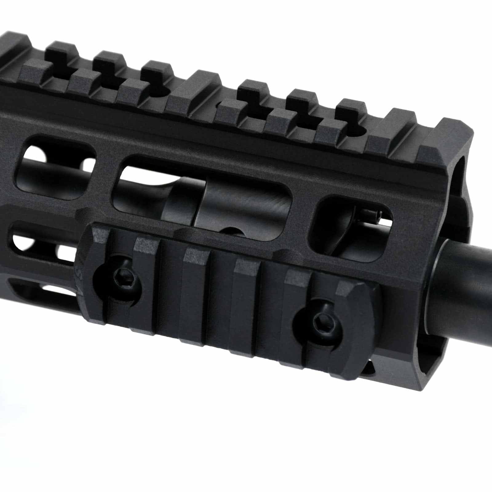 Polymer M-LOK rail section with 5 slots mounted on handguard.