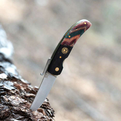 Kam Knife with Micarta handle and N690 stainless steel blade, ideal for outdoor use and survival activities.