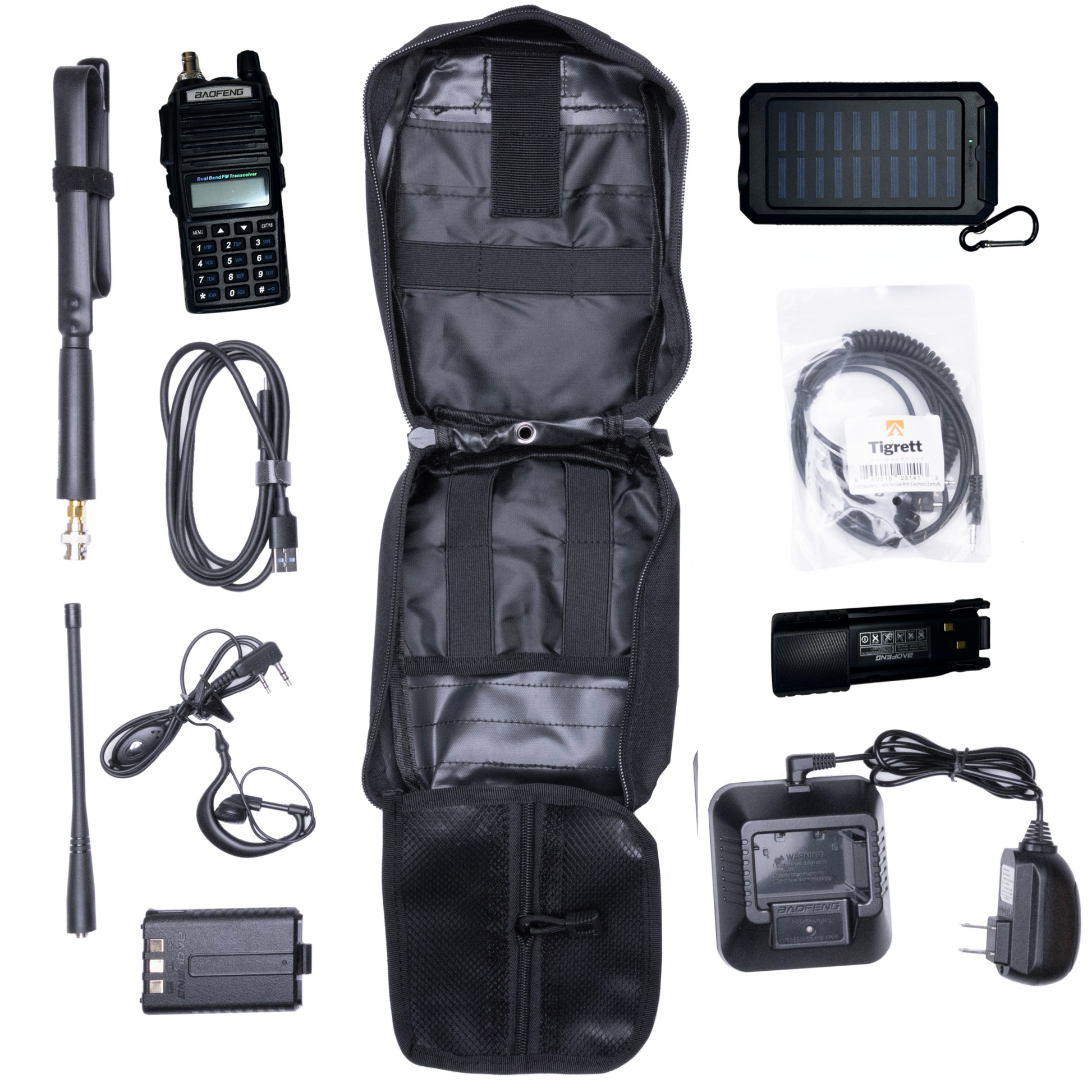 Radio Go Bag with solar charger, UV82HP programmed radio, tactical antenna, extended battery, USB cable, solar charger, BNC adapters, SMC cable, MOLLE-compatible bag.