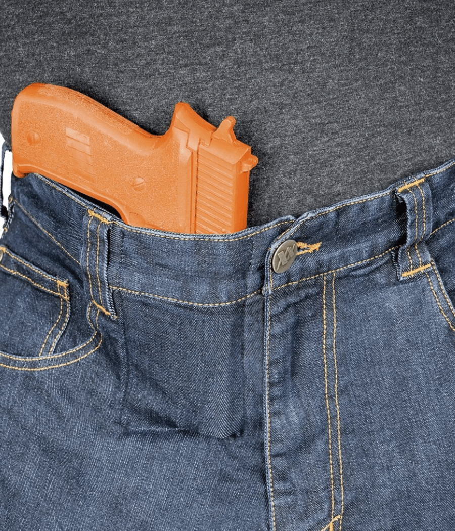 Asset Tactical Jeans with concealed carry pocket and orange firearm replica.