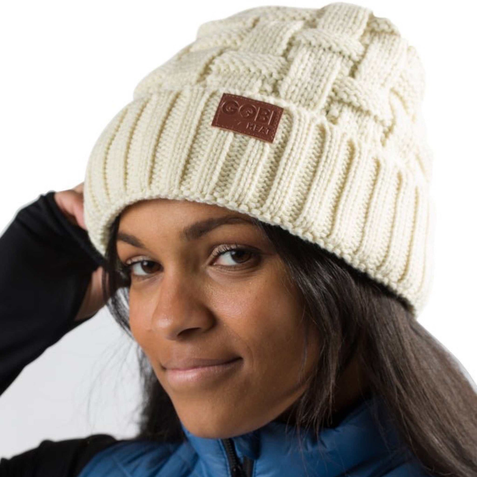 Crest Womens Heated Beanie with dual steel fiber tech heating, cream color.