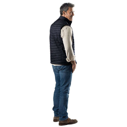 Dune Mens Heated Vest in Onyx worn by model standing sideways, showcasing lightweight design.