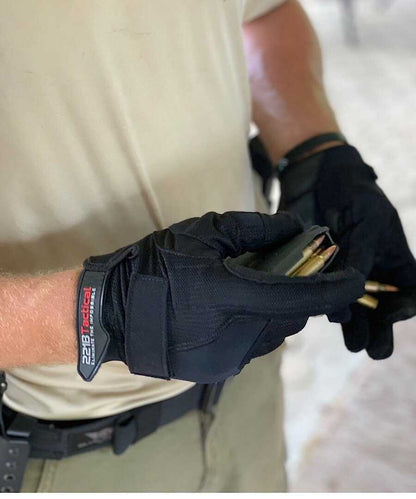 Exxtremity Patrol Gloves 2.0 in use, ideal for police and first responders, featuring smart-touch fingertips and durable synthetic leather.