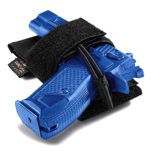 M-Tac CCW modular universal holster with blue pistol insert for discreet carry.