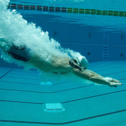 Swimmer using KT Tape Pro Extreme® underwater for support in extreme conditions.