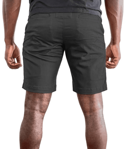 Man wearing Sentry Tactical Shorts in black, showing back view with durable construction and multiple pockets.