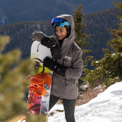 Shift Womens Heated Snowboard Jacket with 5 heat zones, 9-hour battery, and 3 settings for skiing and snowboarding.