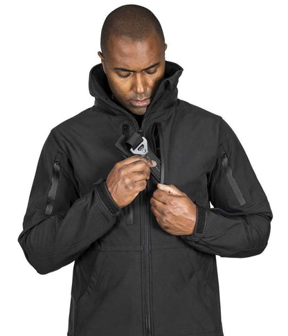 Tradecraft Tactical Jacket 2.0 with concealed pocket zippers and extended collar for protection.