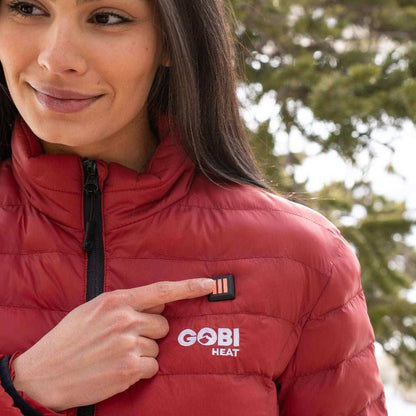 Wolf Women's Heated Jacket with control panel shown; lightweight, durable, and fashionable design.