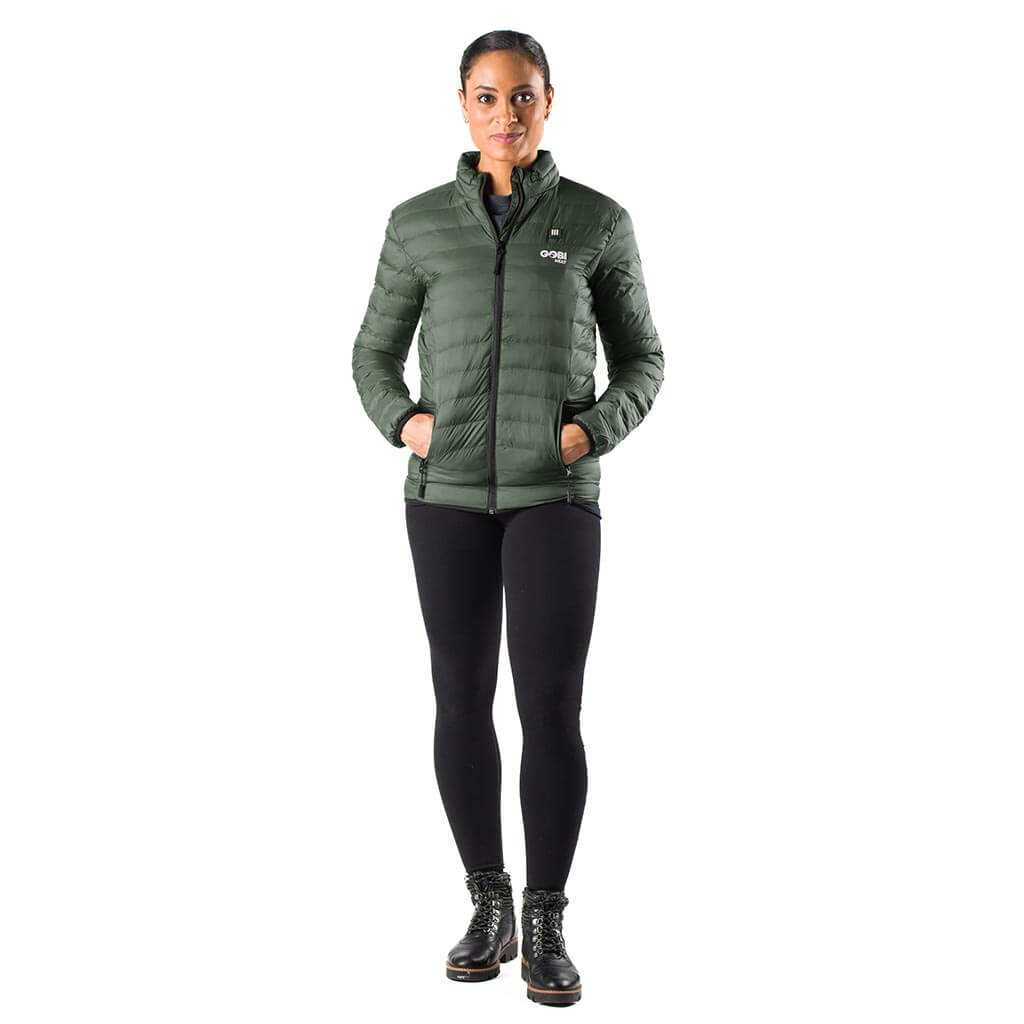 Woman wearing the Wolf Women's Heated Jacket in green, showcasing lightweight and durable design.