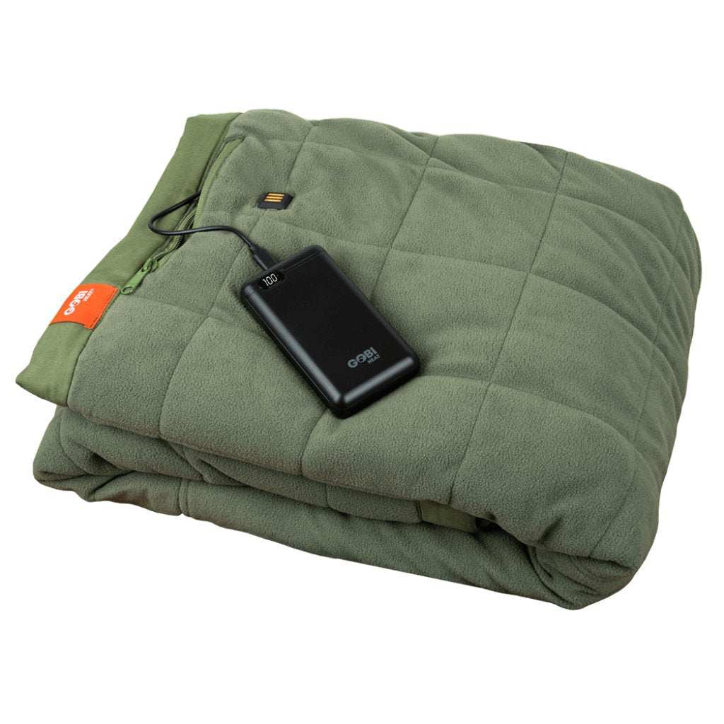 Portable heated blanket with rechargeable battery, green color, ideal for travel and outdoor use.