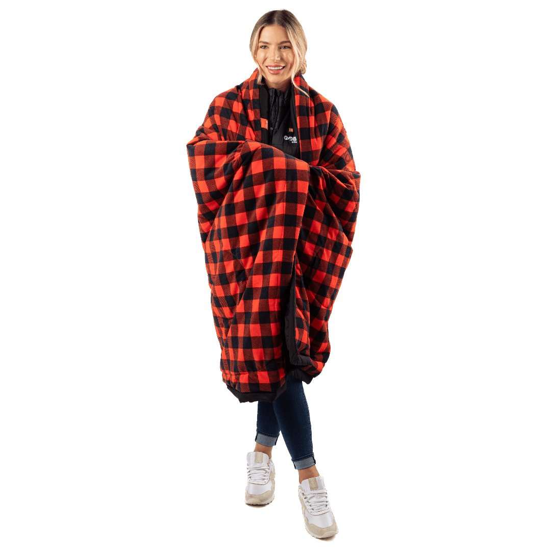 Zen Portable Heated Blanket draped over person, red and black checkered pattern.