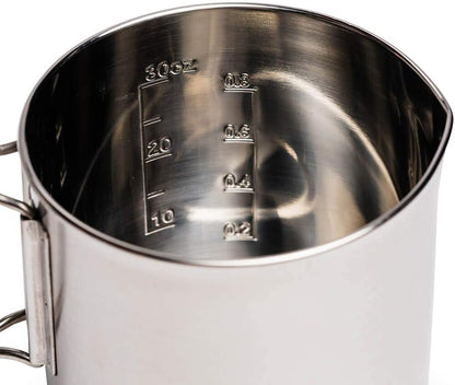 Lightweight stainless steel backpacking pot with volume markings and pour spout, 900ml capacity.